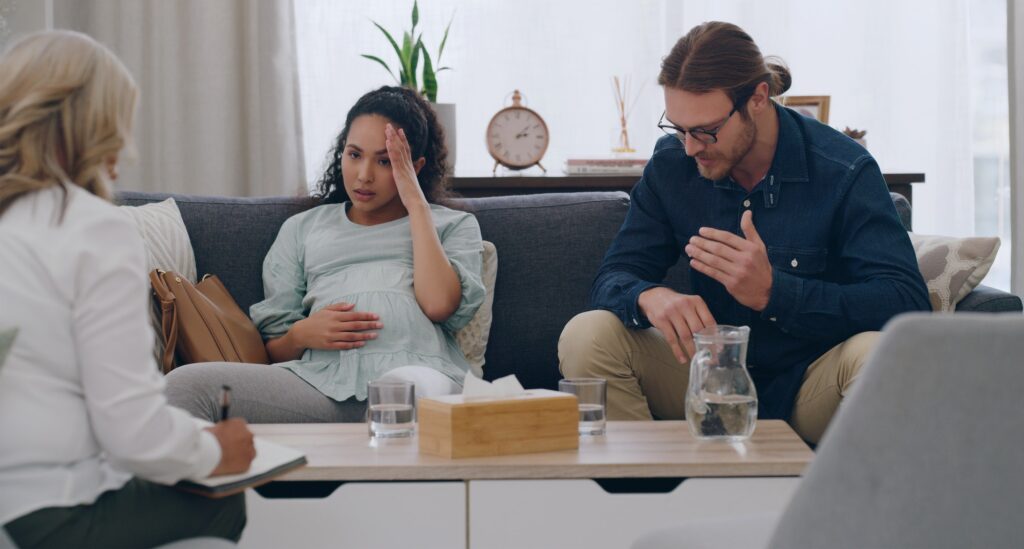 couple psychologist and talking with stress mental health and angry with marriage help in counsel