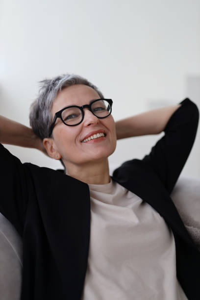 A senior woman radiates happiness and beauty in her portrait